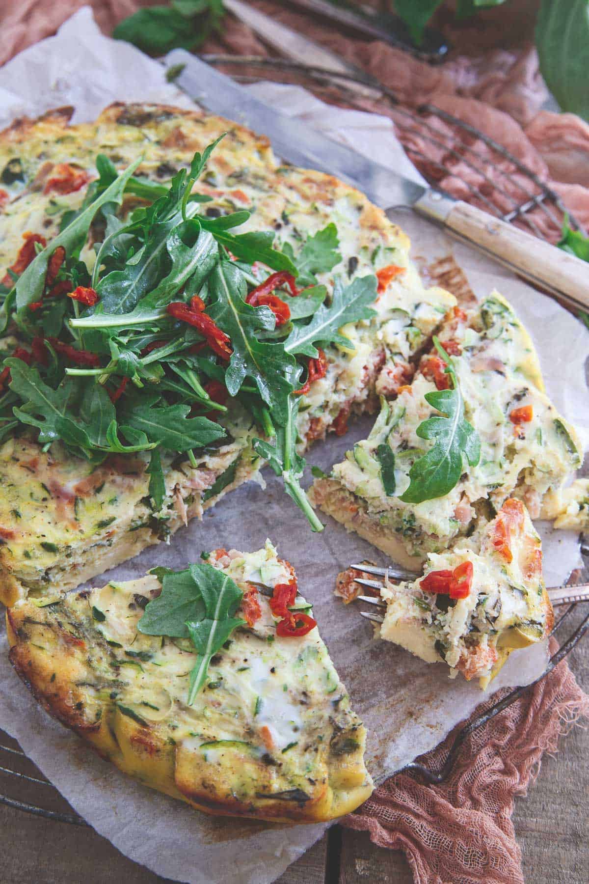 Keep the oven off with this Summer Slow Cooker Frittata bursting with zucchini, tomatoes, basil and prosciutto.