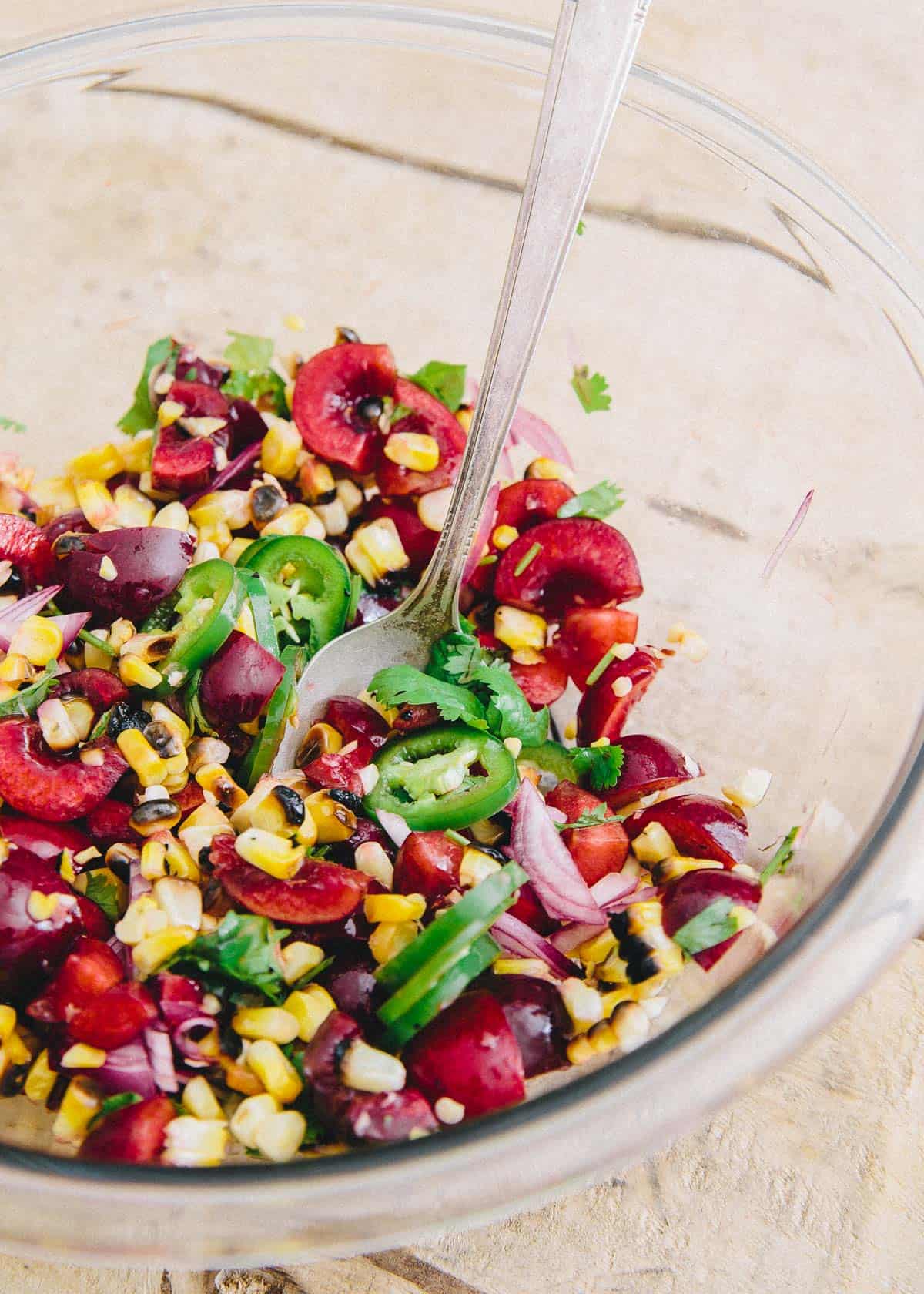 Grilled Corn Cherry Salsa makes the perfect topping for spicy blackened shrimp tacos