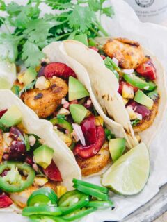 With a simple salsa full of juicy cherries, grilled corn and spicy jalapeños, these blackened shrimp tacos are a great summer meal.
