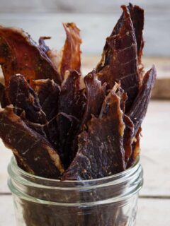 This lamb jerky is seasoned with oregano, soy sauce, worcestershire, garlic and onion, a great alternative to beef and perfect for healthy snacking.
