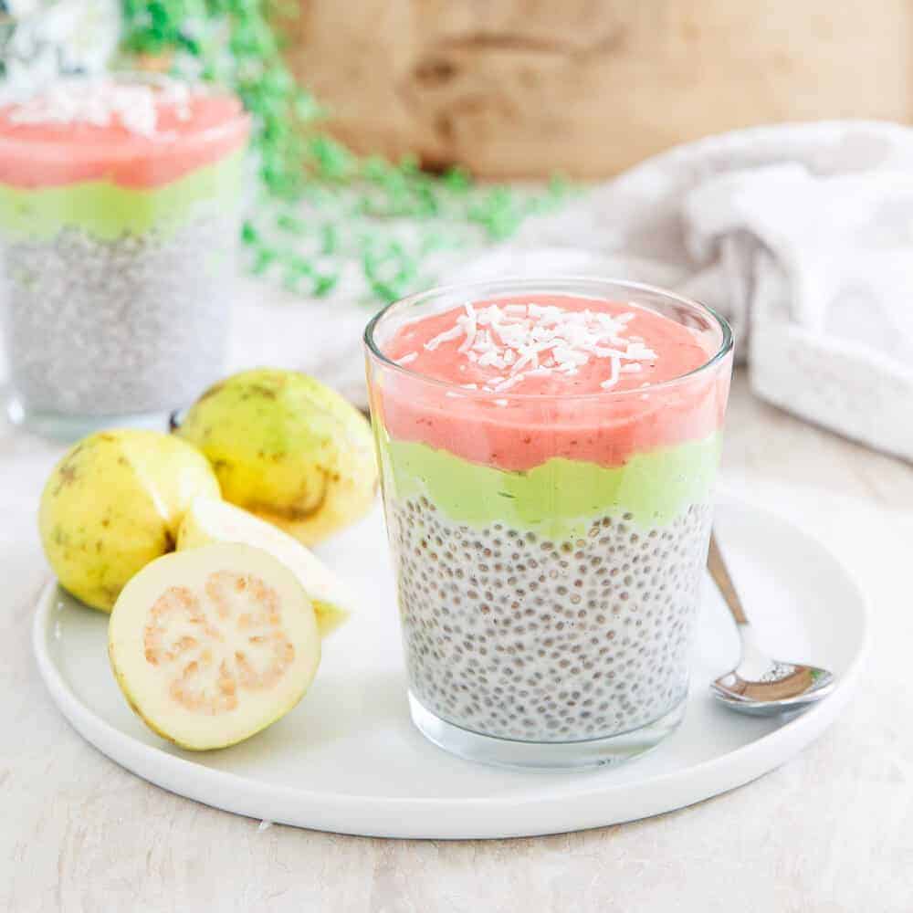 This guava chia pudding has a vanilla chia base, a creamy avocado banana middle layer and a sweet and tangy strawberry guava jam topping.