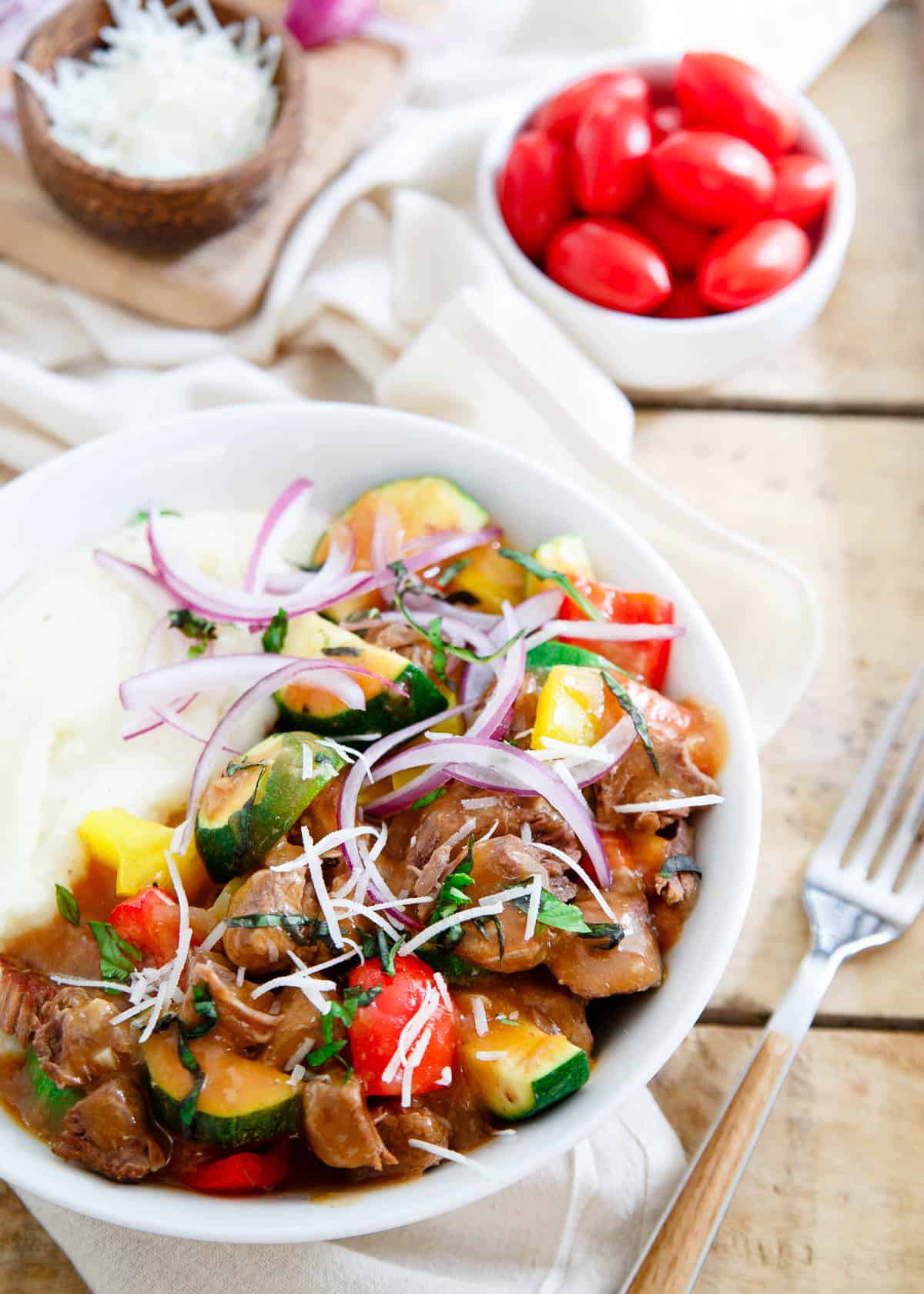 Classic beef stew is given a summer twist with lots of seasonal vegetables in this slow cooker summer beef stew.