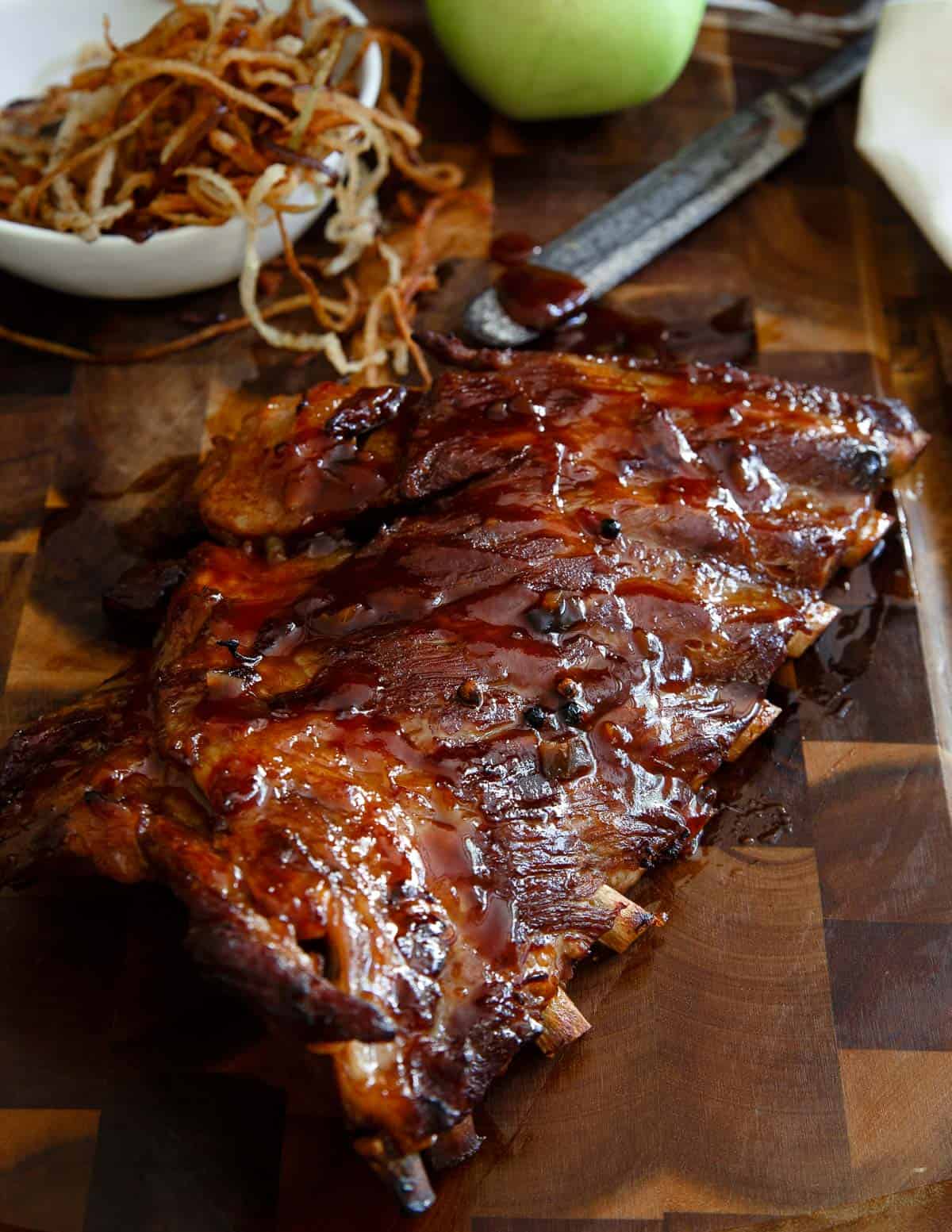 sticky maple apple ribs with shoestring fried apples