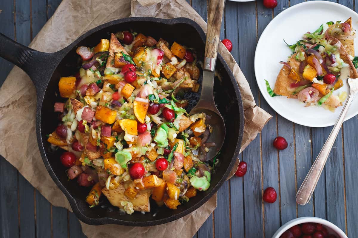 Butternut squash pita nachos with cranberries, pancetta, brussels sprouts and caramelized red onions.