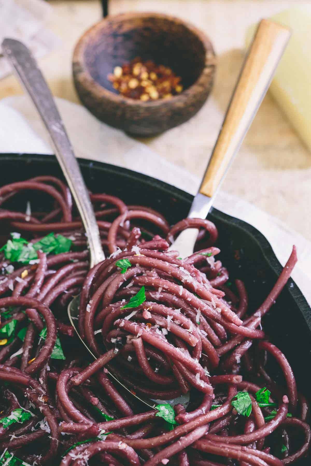 Red Wine Garlic Bucatini makes for a jaw dropping color and elegant meal that couldn't be easier.