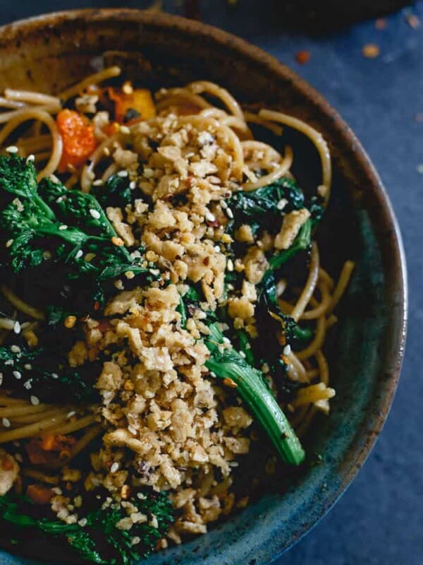 This fall pasta is filled with roasted butternut squash and broccoli rabe, tossed in a creamy almond butter sauce and topped with a buttery garlic cracker crumble.