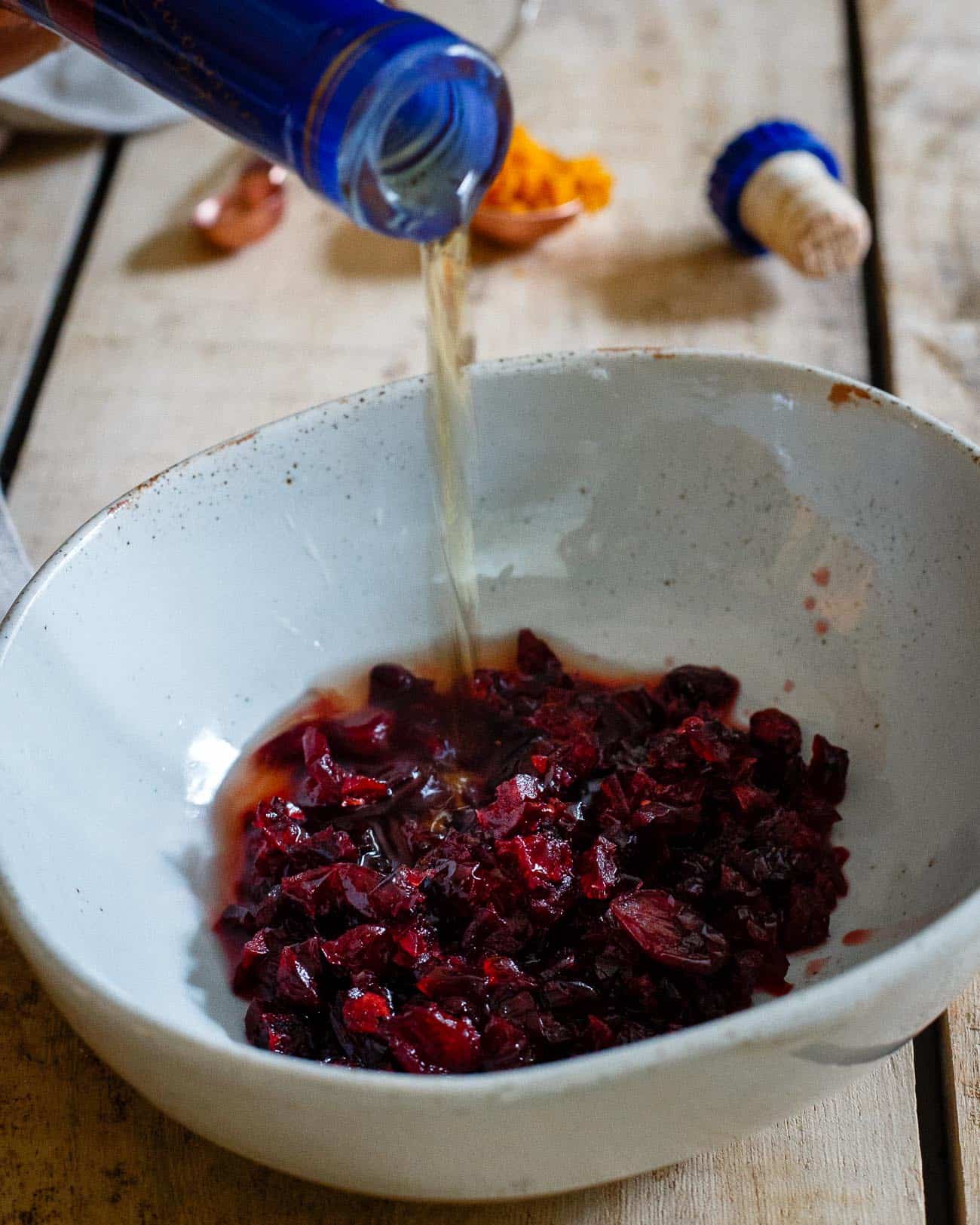 Cognac soaked cranberries make a delicious and festive addition to this compound butter perfect for the holidays!