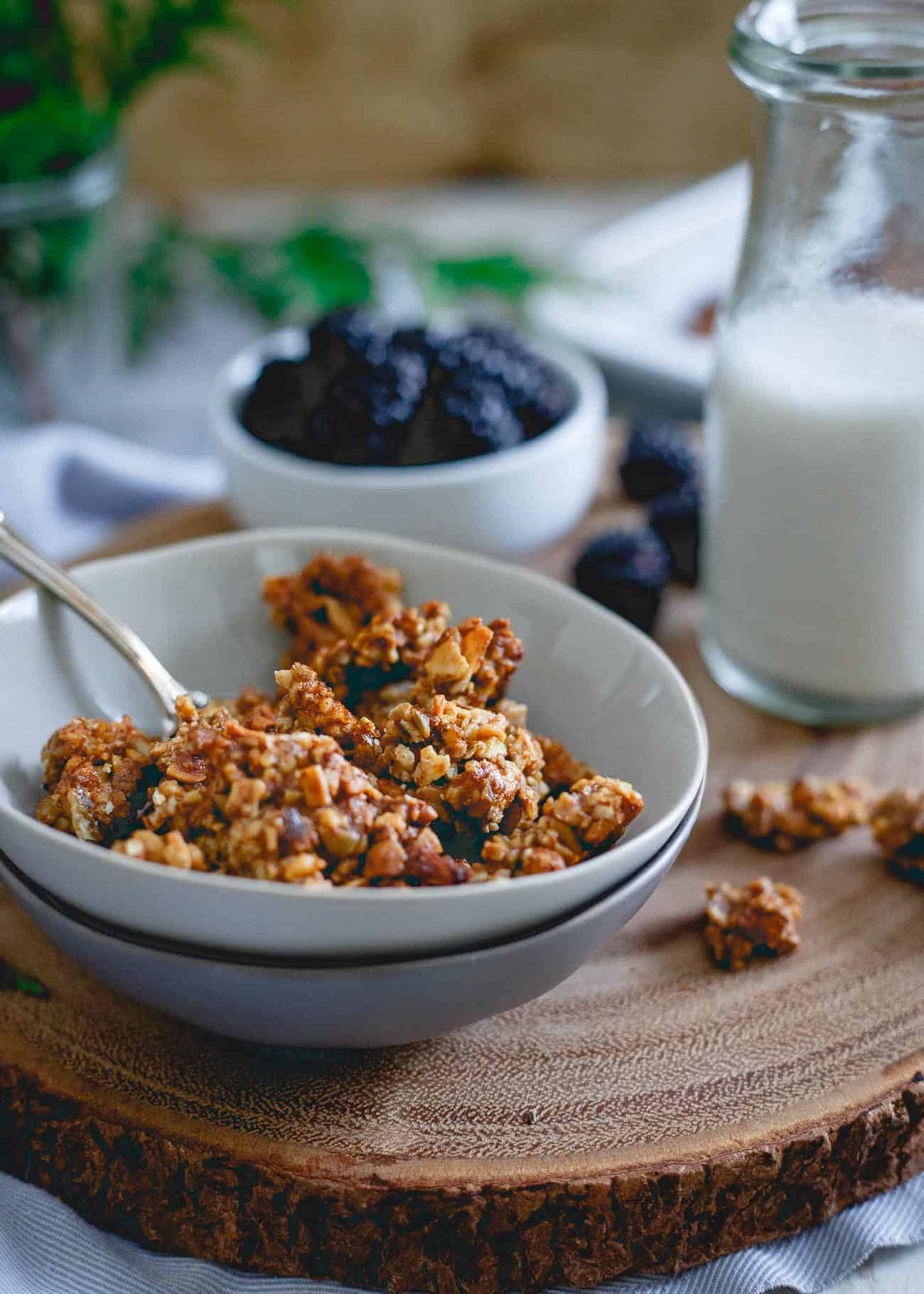 This paleo gingerbread granola is made with all the good stuff, just nuts, seeds and natural sweeteners with a wintertime twist perfect for the holidays.