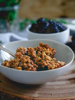 This paleo gingerbread granola is made with all the good stuff, just nuts, seeds and natural sweeteners with a wintertime twist perfect for the holidays.