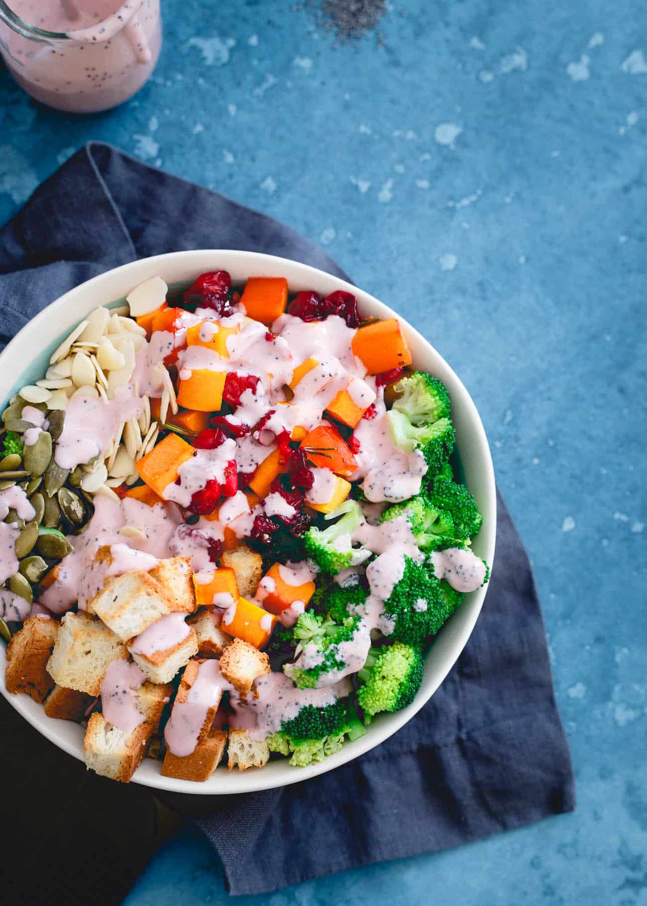 Cranberry broccoli salad drizzled with homemade dressing.