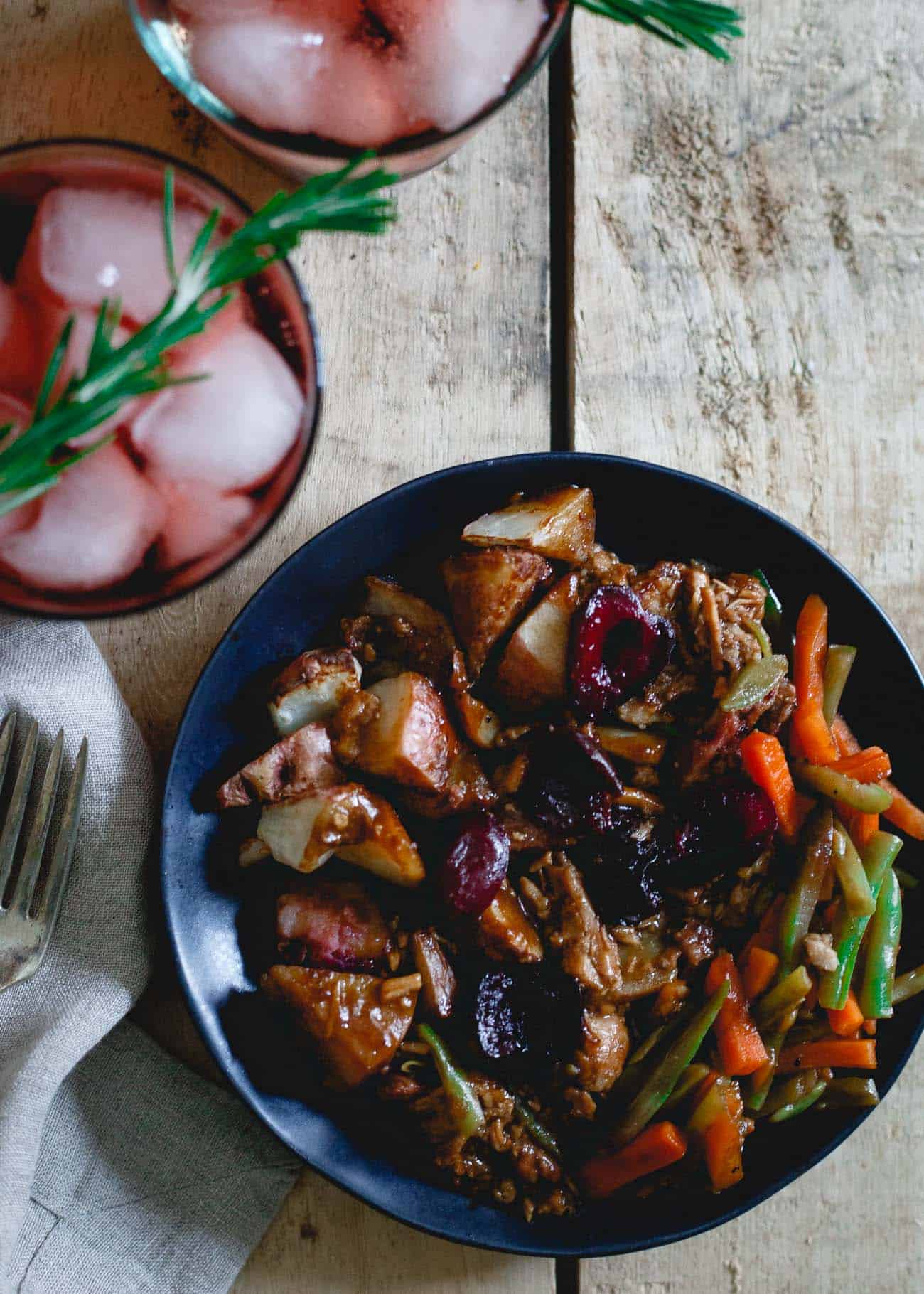 This tart cherry red wine spritzer is the perfect accompaniment to this cherry port pork dinner.
