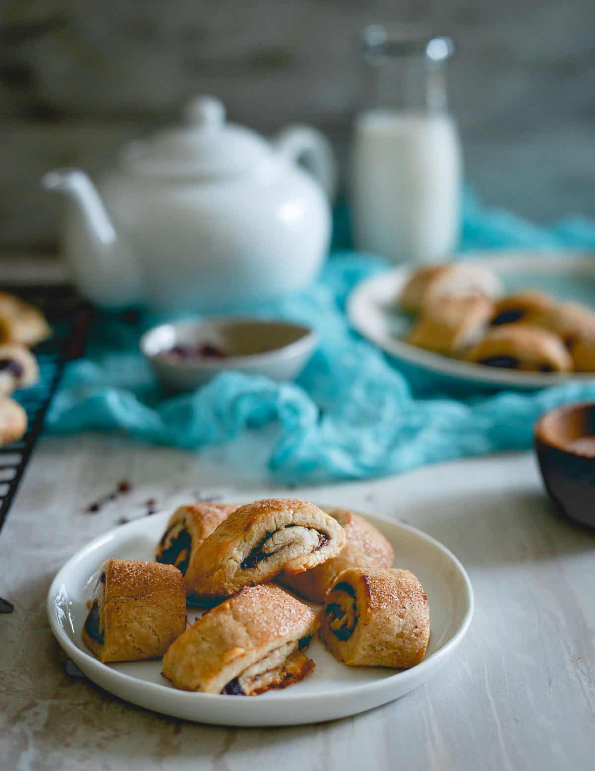 These gluten free apple butter rugelach are studded with cacao nibs for a crunchy bite. They're buttery, soft and a fun cookie option for the season!