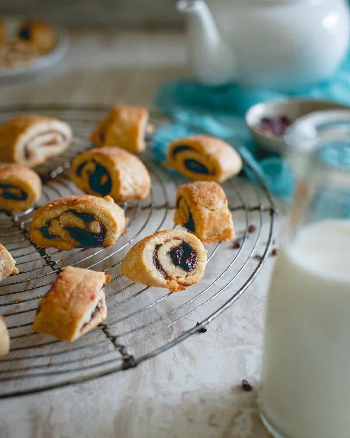 Chewy, buttery soft rugelach are made gluten free and festive for the season with an apple butter filling.