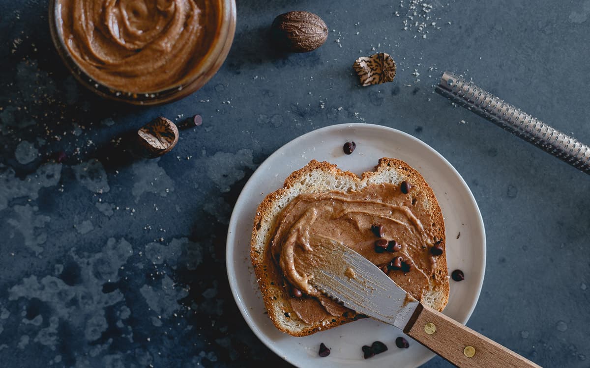 Enjoy this creamy gingerbread peanut butter spread this holiday season as a festive addition to day!