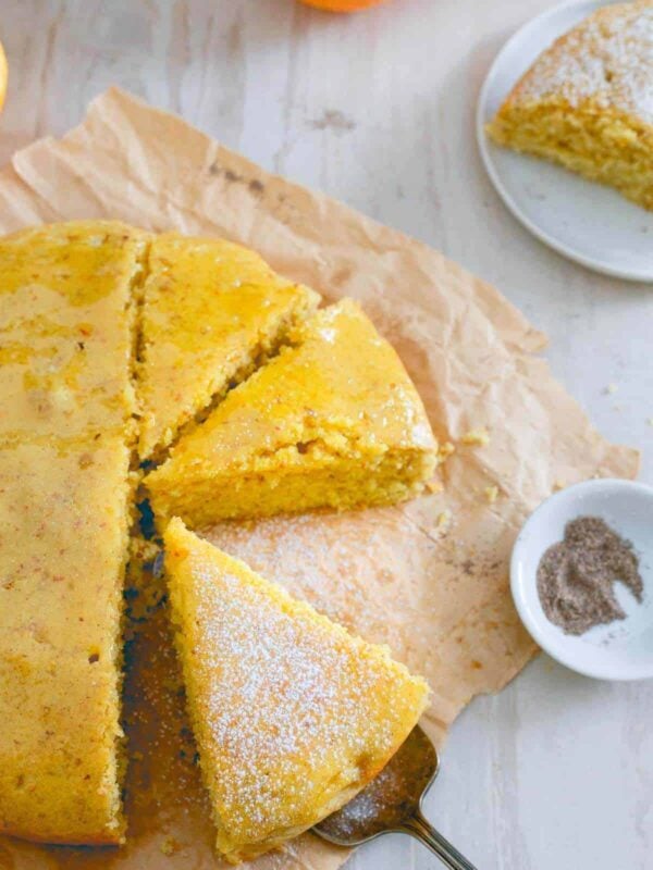 This moist, hearty orange cardamom cake is the perfect with a hot mug of your favorite winter drink is the best way to celebrate this holiday season.