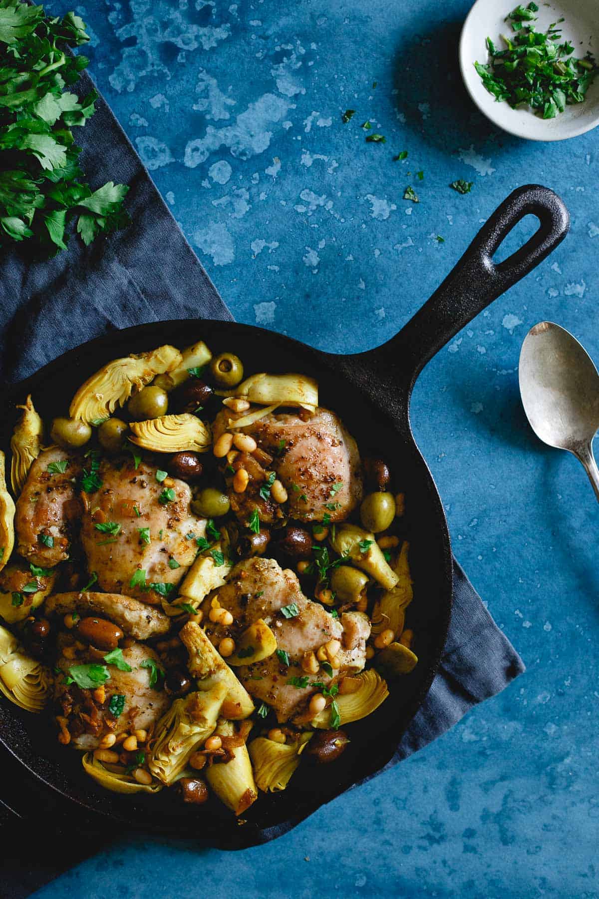 This one pan chicken artichoke olive skillet is filled with Mediterranean style ingredients for an easy weeknight meal packed with flavor.