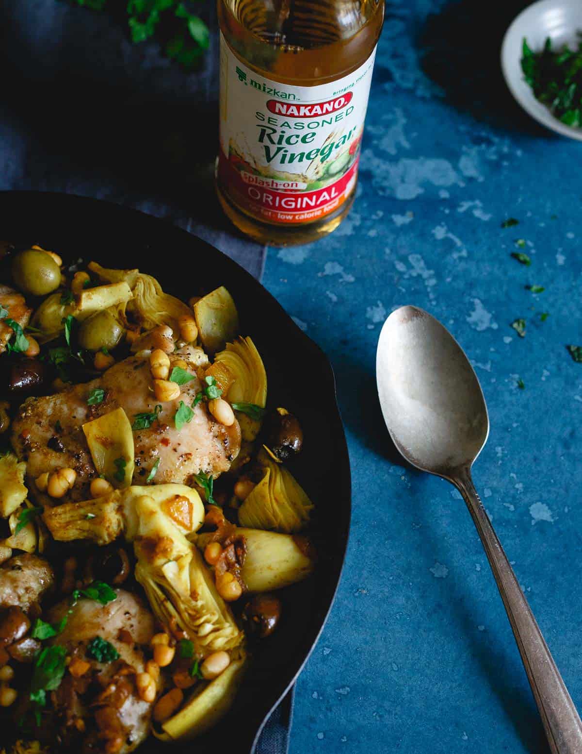 Rice vinegar gives this Mediterranean inspired chicken artichoke olive skillet a tangy punch of flavor in each bite.