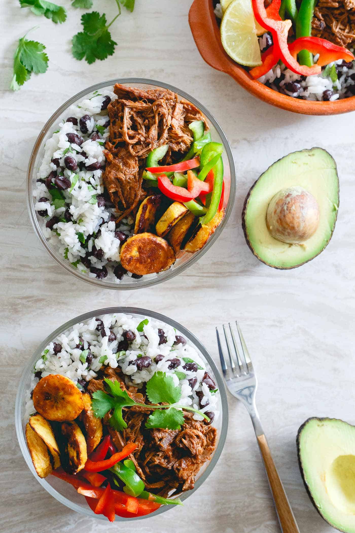 Make a batch of this slow cooker Mexican shredded beef and assemble into bowls at the start of the week for easy lunches and dinners.