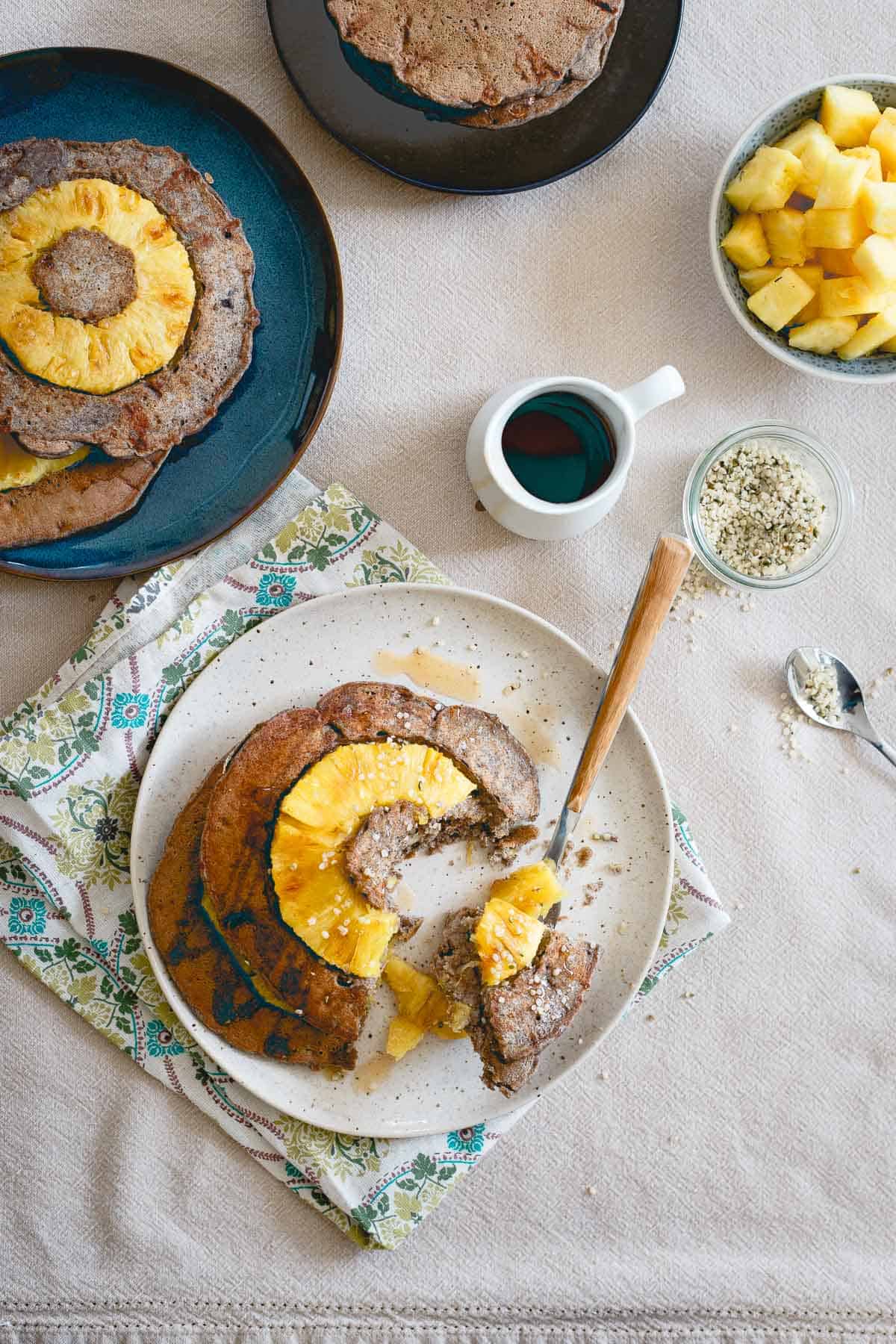 With a drizzle of maple syrup and a fresh pineapple ring in each one, these hearty buckwheat pancakes are a well balanced start to the day.