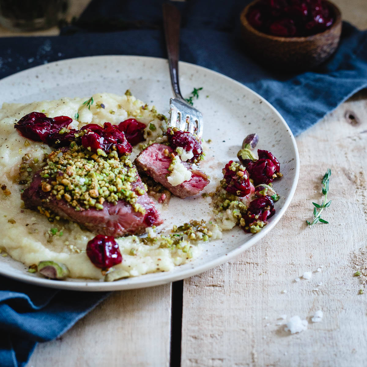 A Valentine's Day dinner better than any restaurant, pistachio crusted lamb chops with red wine cherries and parmesan polenta.