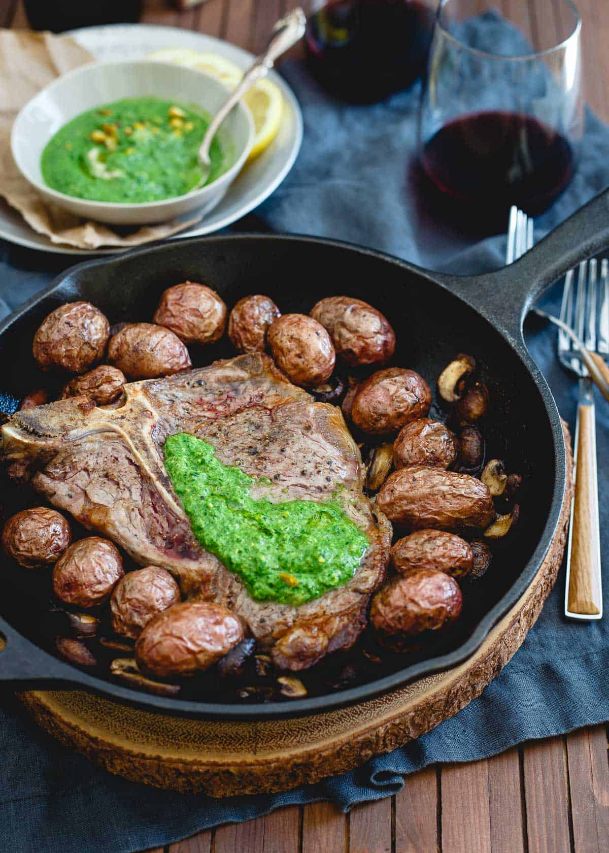 porterhouse steak skillet with spinach horseradish pesto