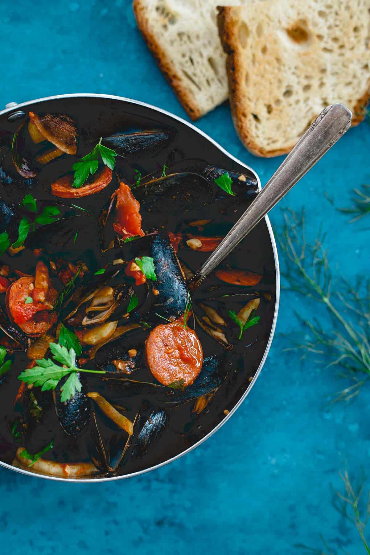 This one-pot mussels dish gets a spicy Spanish twist with chorizo, chilis and fennel.