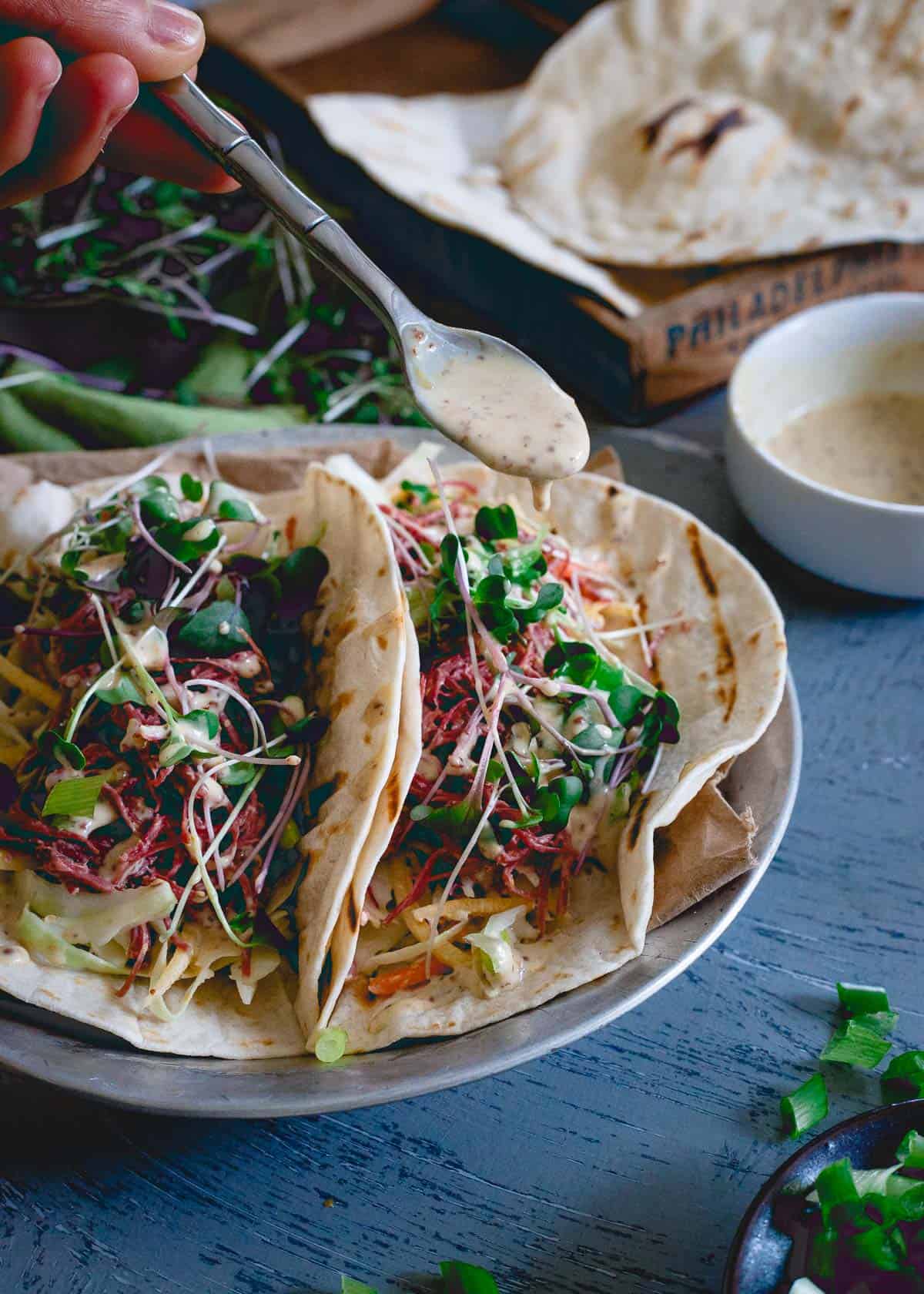 The spicy brown mustard sauce totally makes these corned beef tacos. They even have a horseradish kick to them too!