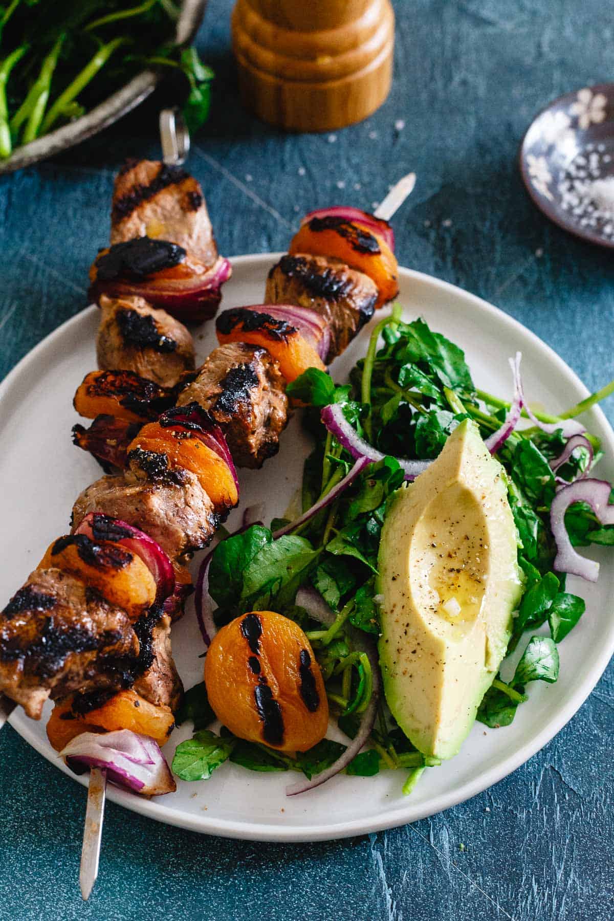 Sweet, plump apricots go perfectly with these smoky grilled lamb kebabs in this simple spring meal.