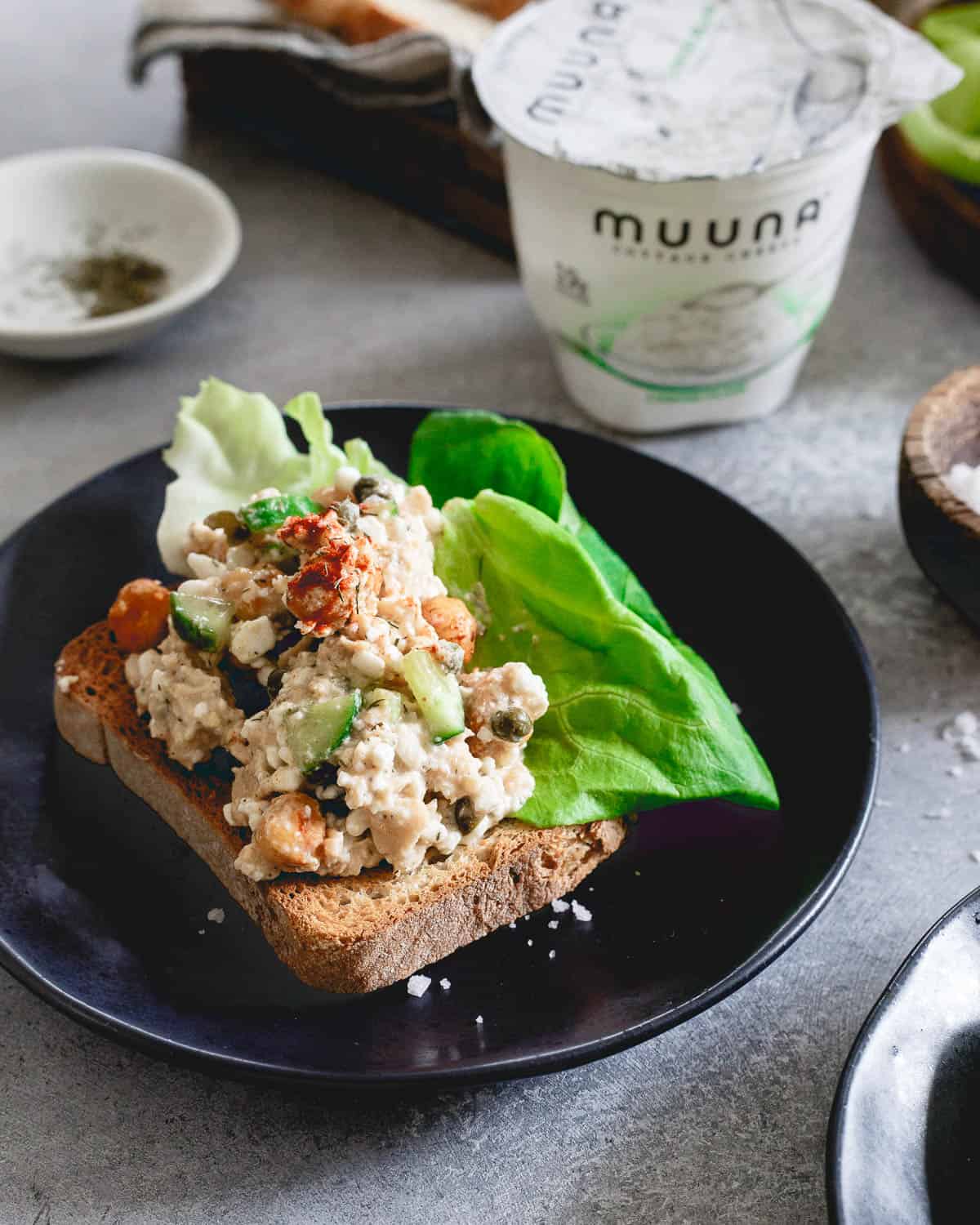 This easy salmon salad is a protein packed, nutritious and flavorful lunch made with fresh dill, lemon, dijon mustard, salty capers, smoky roasted chickpeas and cottage cheese. Serve it on some toasted bread or in lettuce wraps.