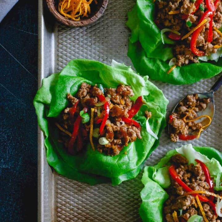 These turkey Asian lettuce wraps are infused with a sticky, sweet, savory and slightly spicy orange sauce making them an irresistibly easy and tasty meal.