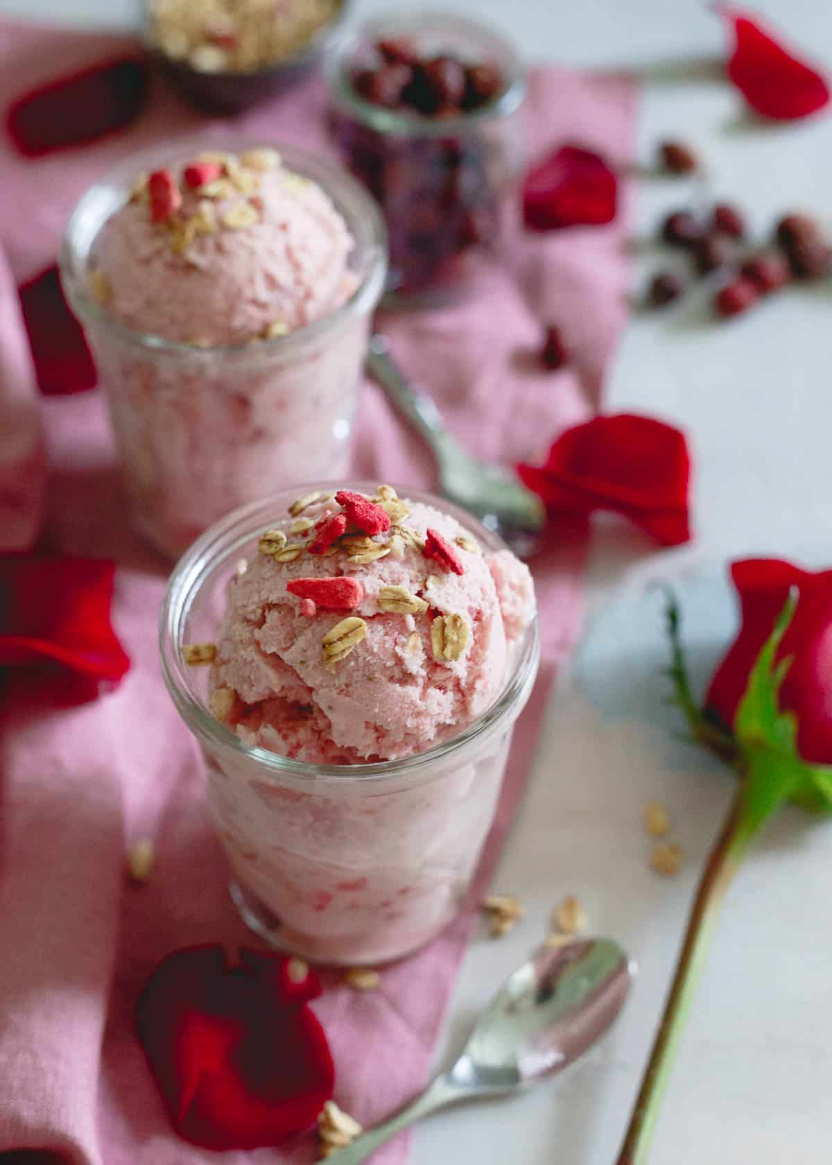 Creamy with a subtle hint of tang, this rosehip ice cream with strawberries and granola is a refreshing icy treat.