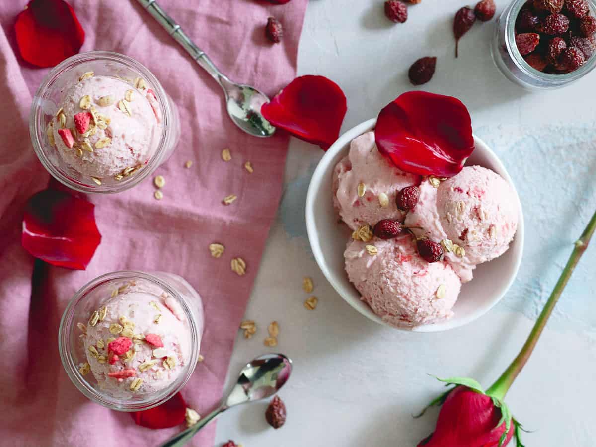 Strawberry rosehip ice cream is the perfect way to celebrate spring. The perfect balance of creamy and tangy as it's actually half ice cream, half frozen yogurt!