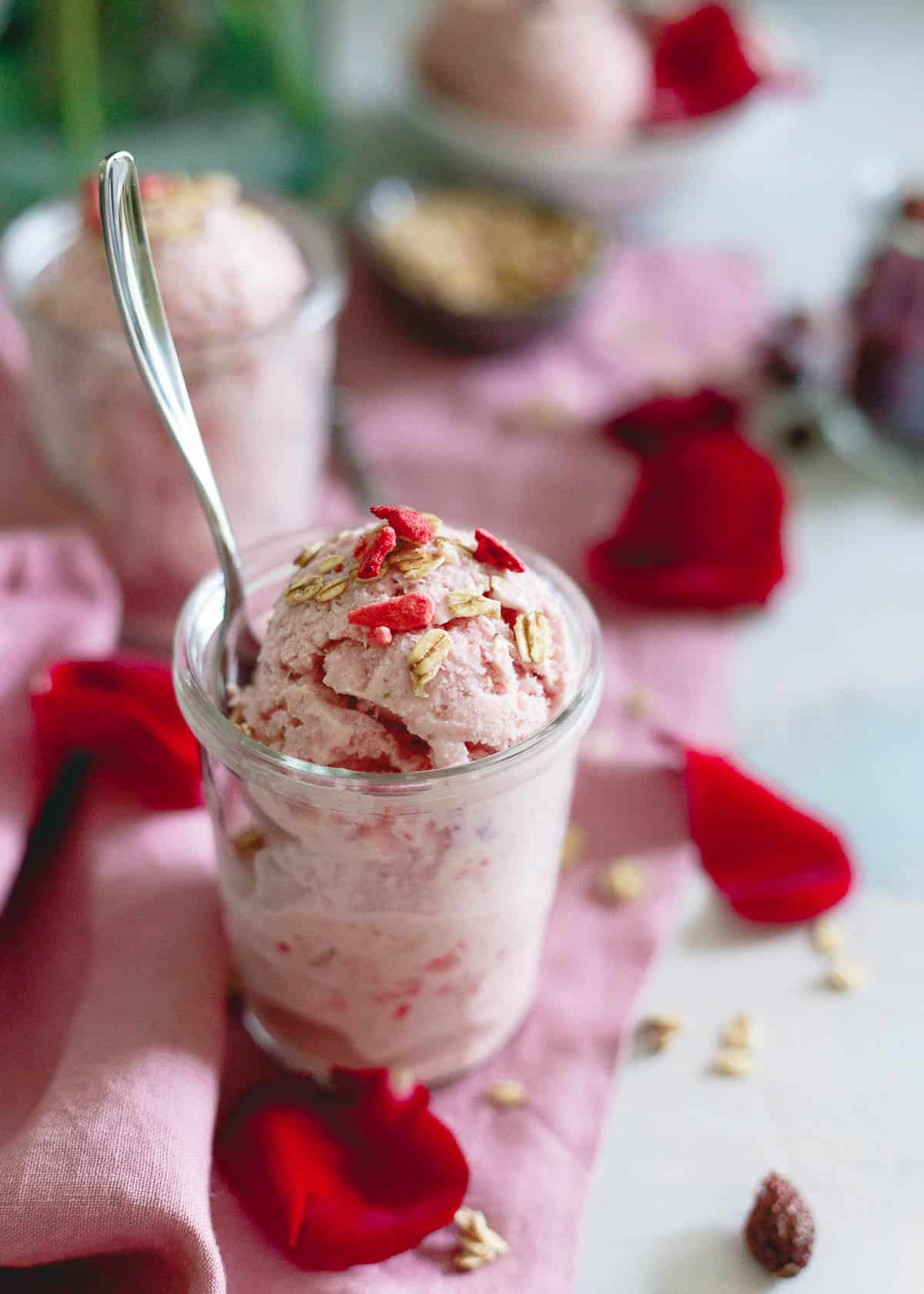 This rosehip ice cream is made with half milk, half Greek yogurt for the perfect balance of creaminess and tang. It's filled with strawberries, granola and infused with a subtle rosehip flavor making it a great spring dessert.