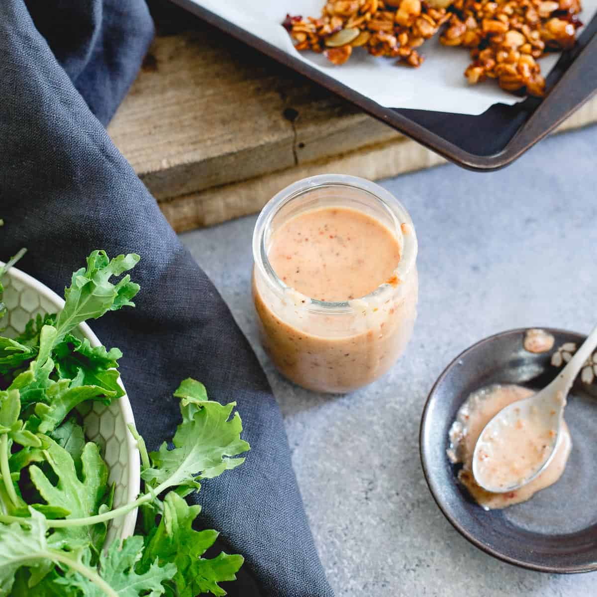 Tart cherries and dijon mustard combine in this easy homemade dressing to liven up this bay scallop baby kale corn salad.