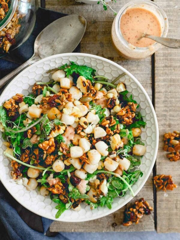 This bay scallop baby kale corn salad is served with a savory tart cherry granola and a cherry dijon dressing. Eating well in the summer never looked so good!