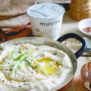 This roasted garlic white bean dip has a secret ingredient: cottage cheese! It lends a super creamy texture and healthy protein boost to each bite.