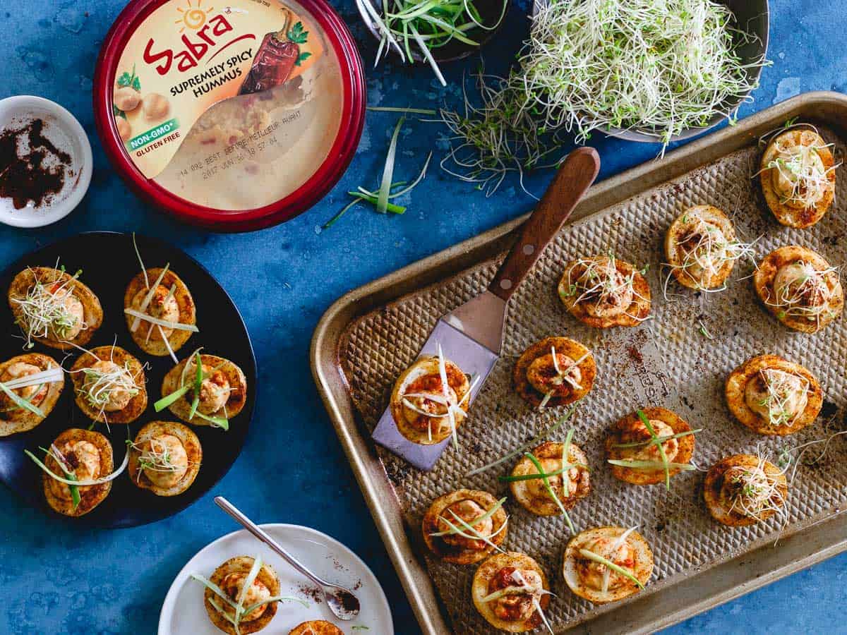 Sabra's supremely spicy hummus is stuffed into spice rubbed mini roasted potatoes. A fun appetizer with a kick!