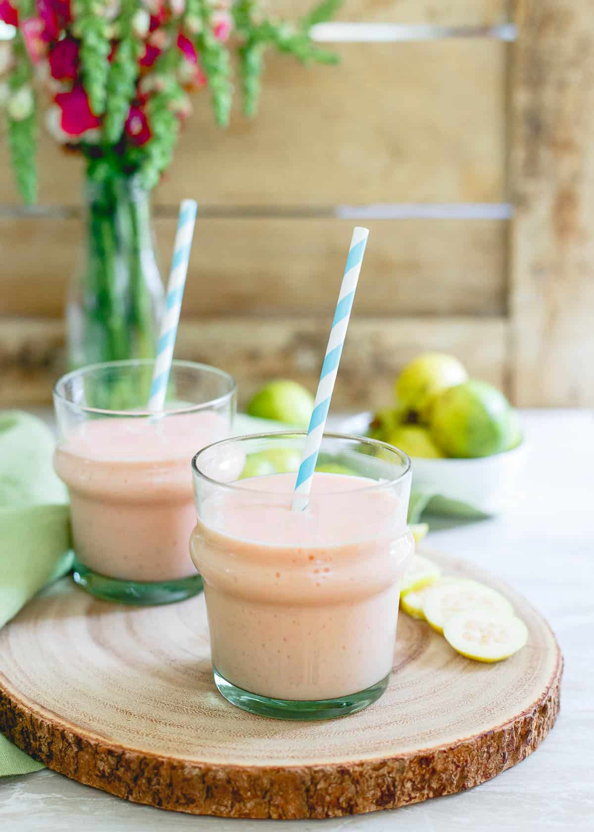 This simple guava pineapple smoothie is made with light coconut milk and a few frozen strawberries for a refreshing dairy-free summer drink.