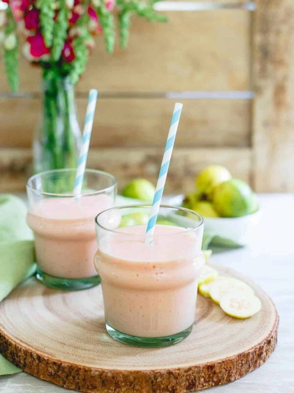 This simple guava pineapple smoothie is made with light coconut milk and a few frozen strawberries for a refreshing dairy-free summer drink.