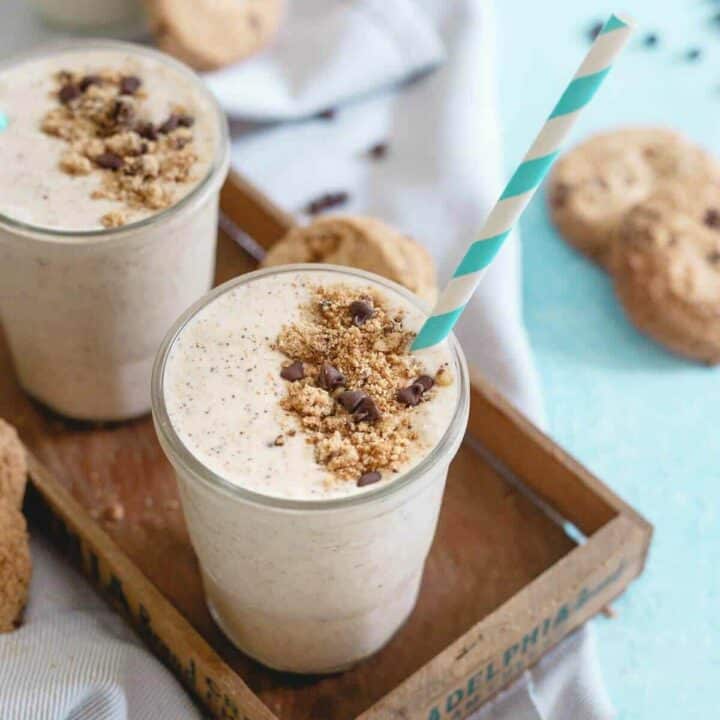 This chocolate chip cookie milkshake is made with maple pecan gluten-free cookies, coconut milk and cashew butter for a creamy cookie dough tasting treat!