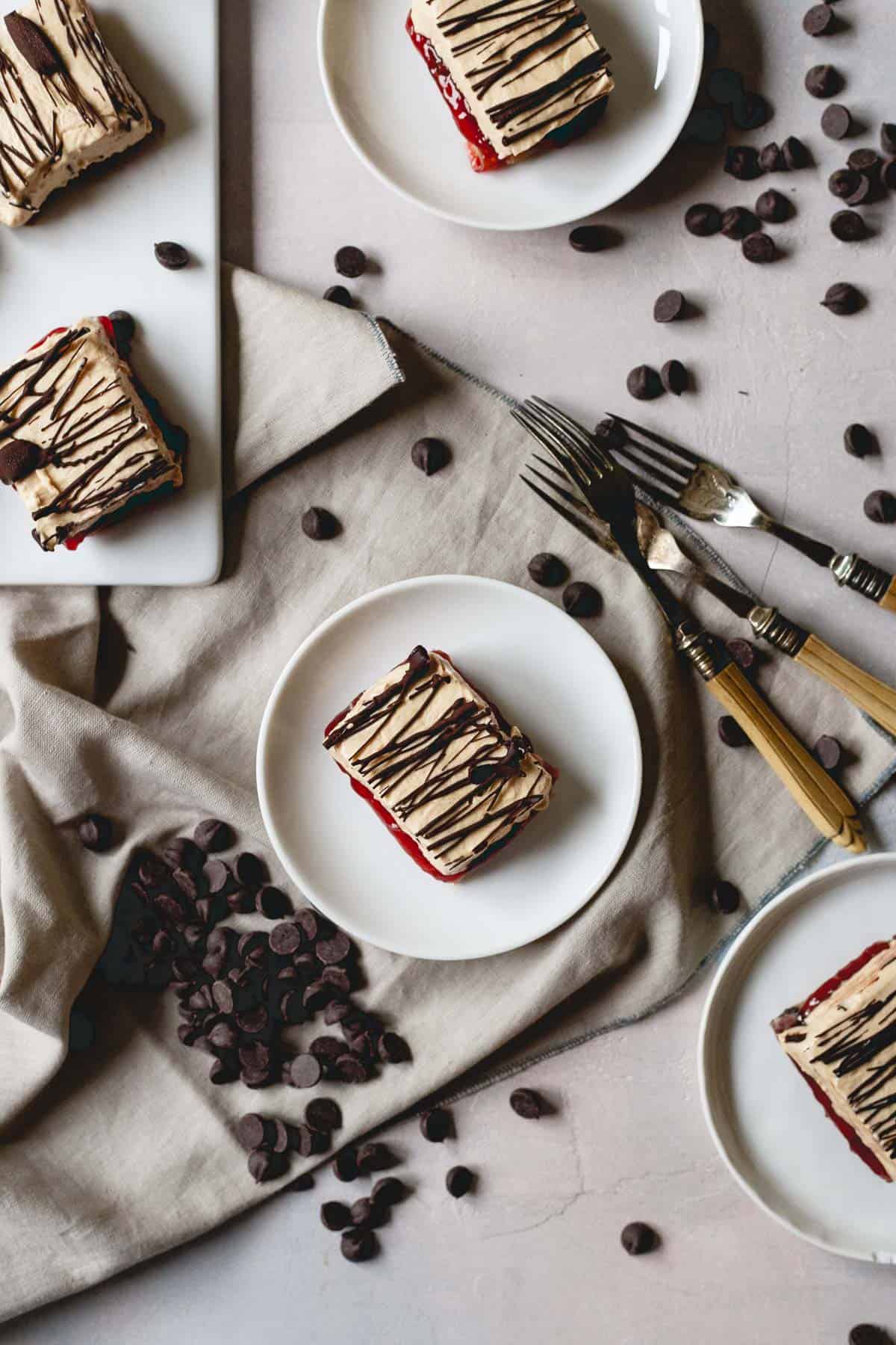 The classic combination of peanut butter and jelly combine in these frozen yogurt bars studded with dark chocolate chips and a chocolate drizzle!