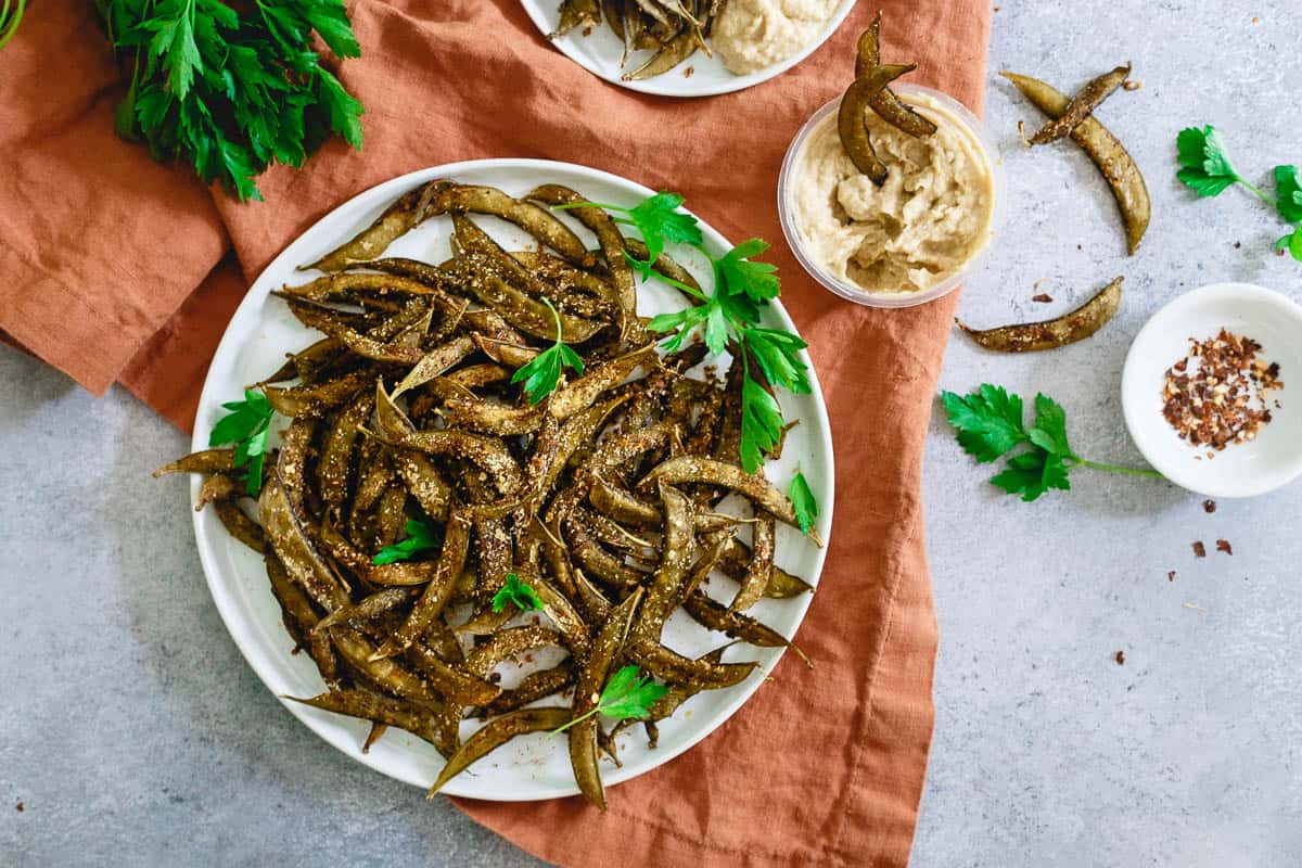 These easy to make homemade snap pea crisps rival the store bought kind and YOU get to decide the seasoning!