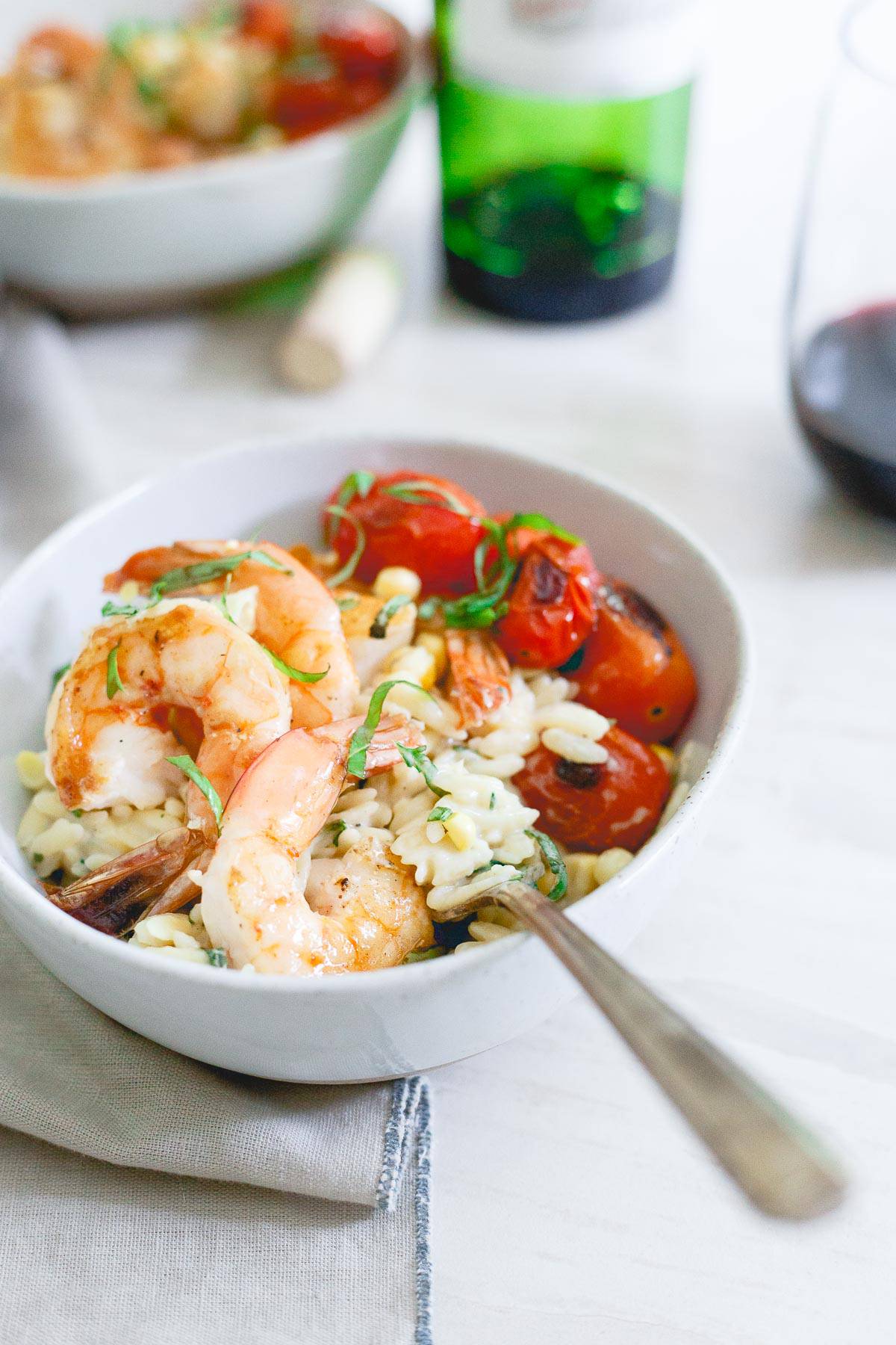 This elegant summer meal of brown butter shrimp with creamy parmesan orzo is perfect for a date night in.