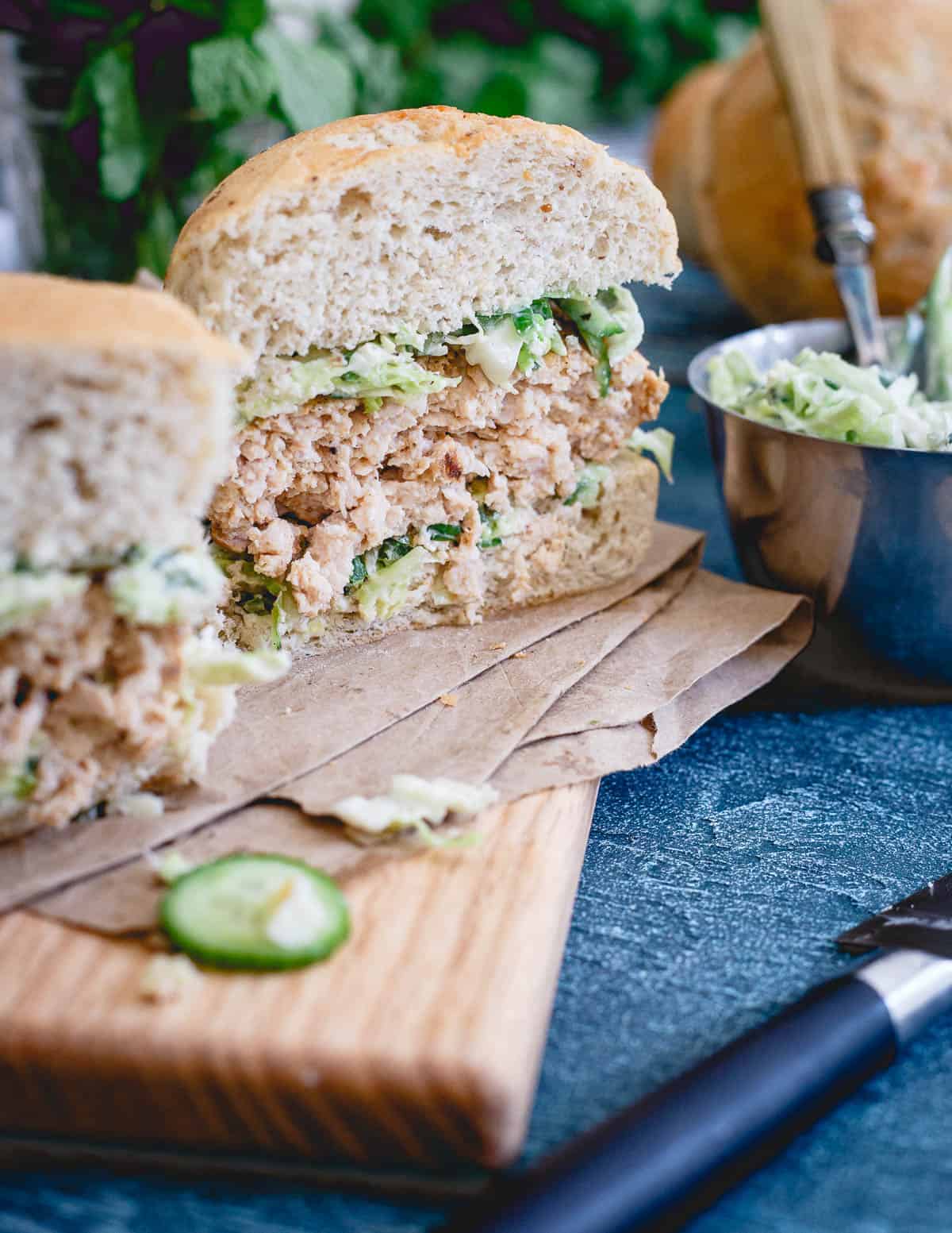 Bursting with Indian flavor, these chicken burgers are topped with a refreshing yogurt cucumber cabbage slaw.