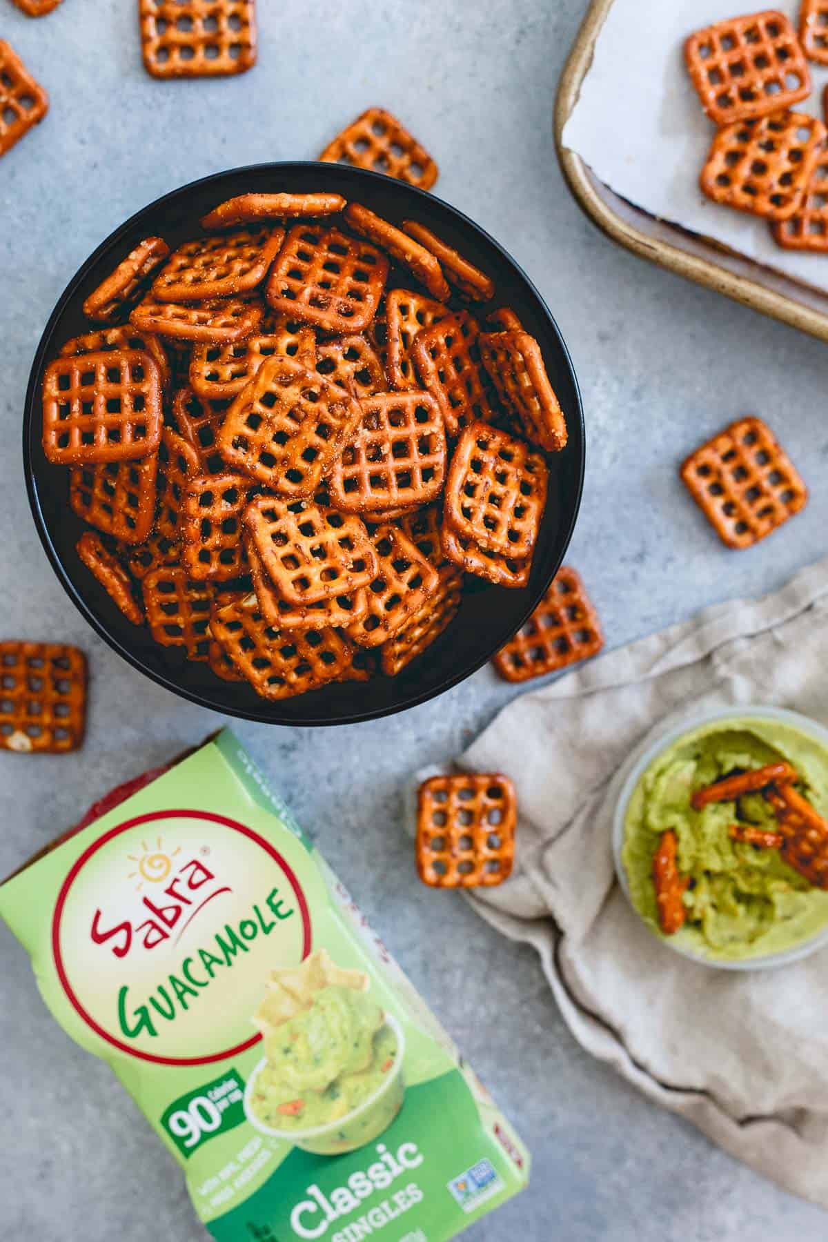 Spicy seasoned pretzels are like the best part of Chex mix in a bowl. Adjust to your taste and dip in some guacamole for an easy homemade snack!