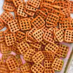 Spicy pretzel recipe on a baking sheet.