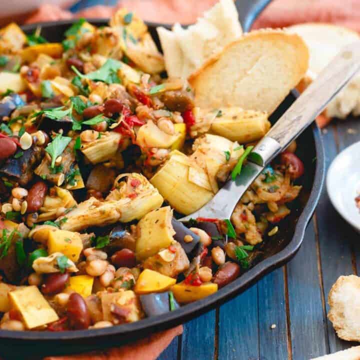 This vegetable bean skillet is packed with all the delicious end of summer garden vegetables and given a hearty, protein boost from two kinds of beans for an easy meatless meal.