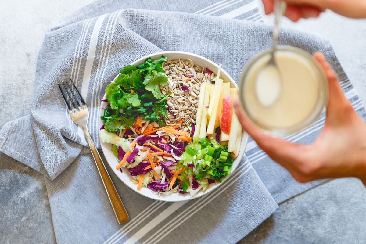 Drizzle this easy creamy kefir honey mustard dressing over your favorite salad for a probiotic boost to your meal.