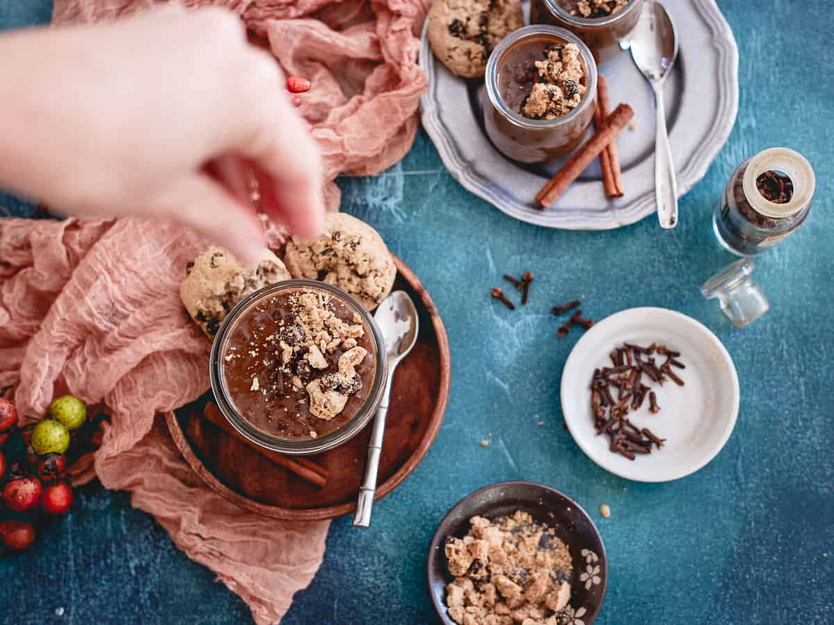 Adding oatmeal raisin cookie crumbles to the top of this dirty chai tapioca pudding makes it even more of a decadent dessert!