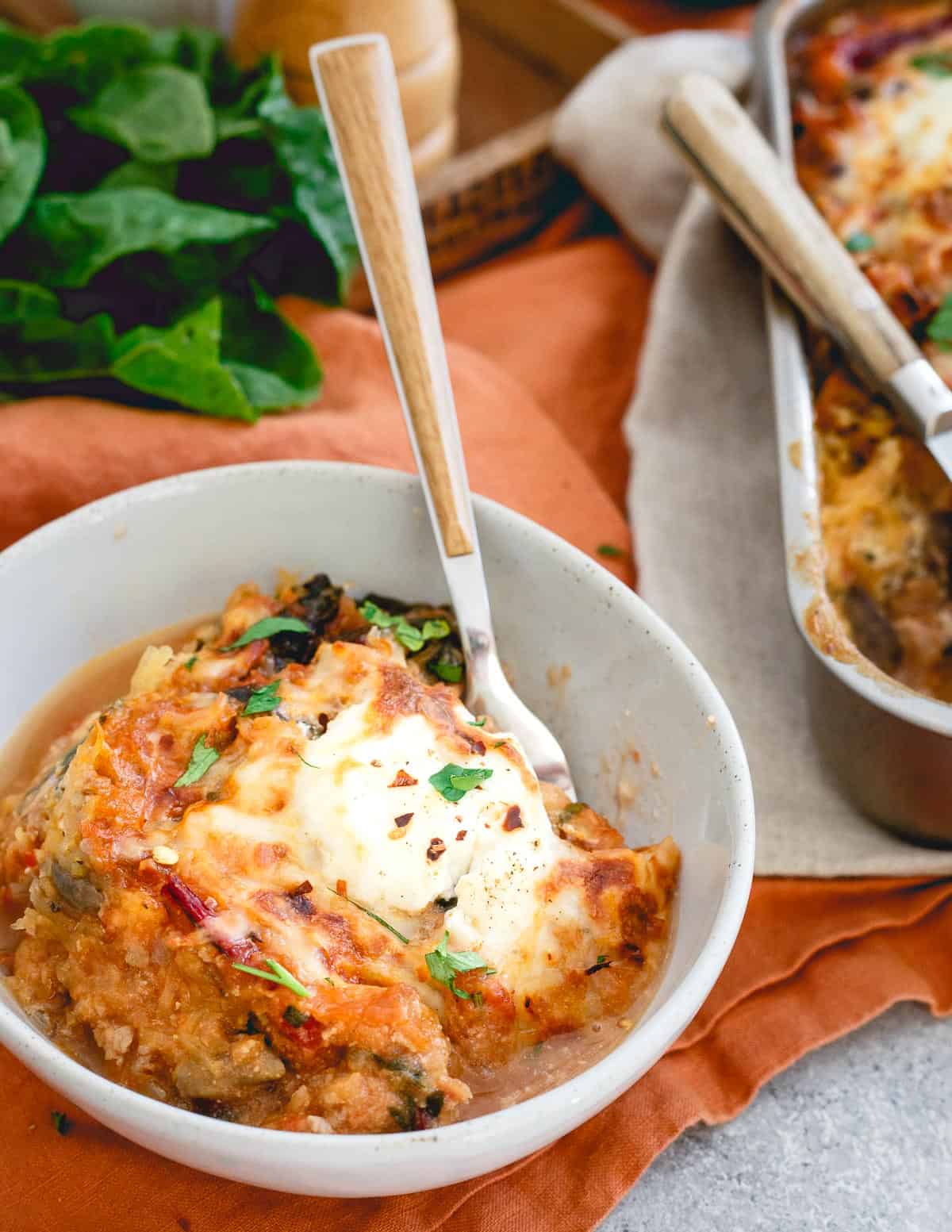 Cheesy, hearty and delicious, you won't miss the noodles in this spaghetti squash baked ziti.